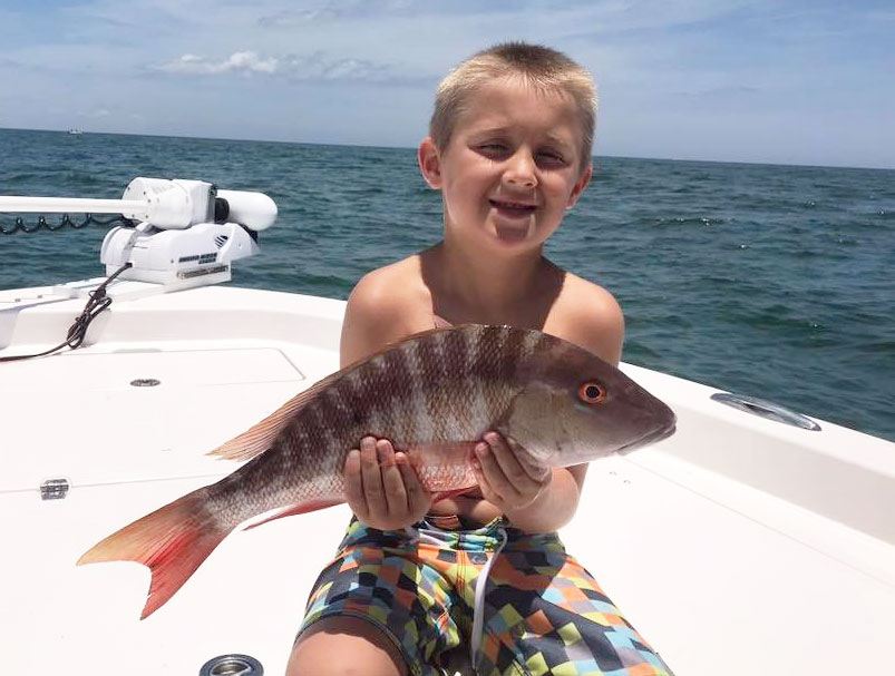 Noah caught this keeper Mutton snapper fishing with Capt. Glyn Austin of Going Coastal Charters