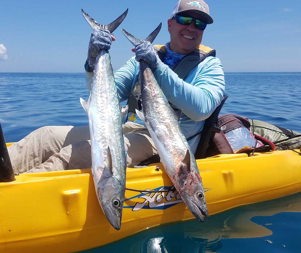 double fisting kingfish in a kayak!