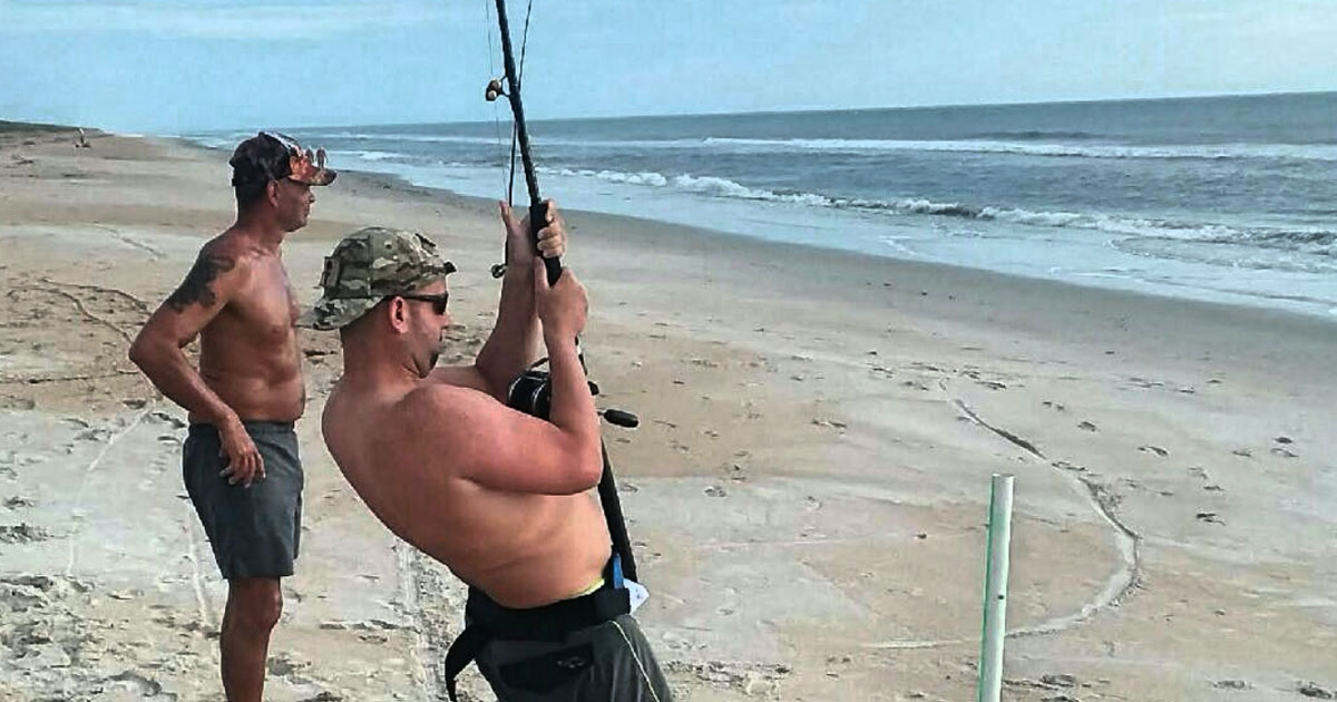 Shark fishing in the surf and on the beach